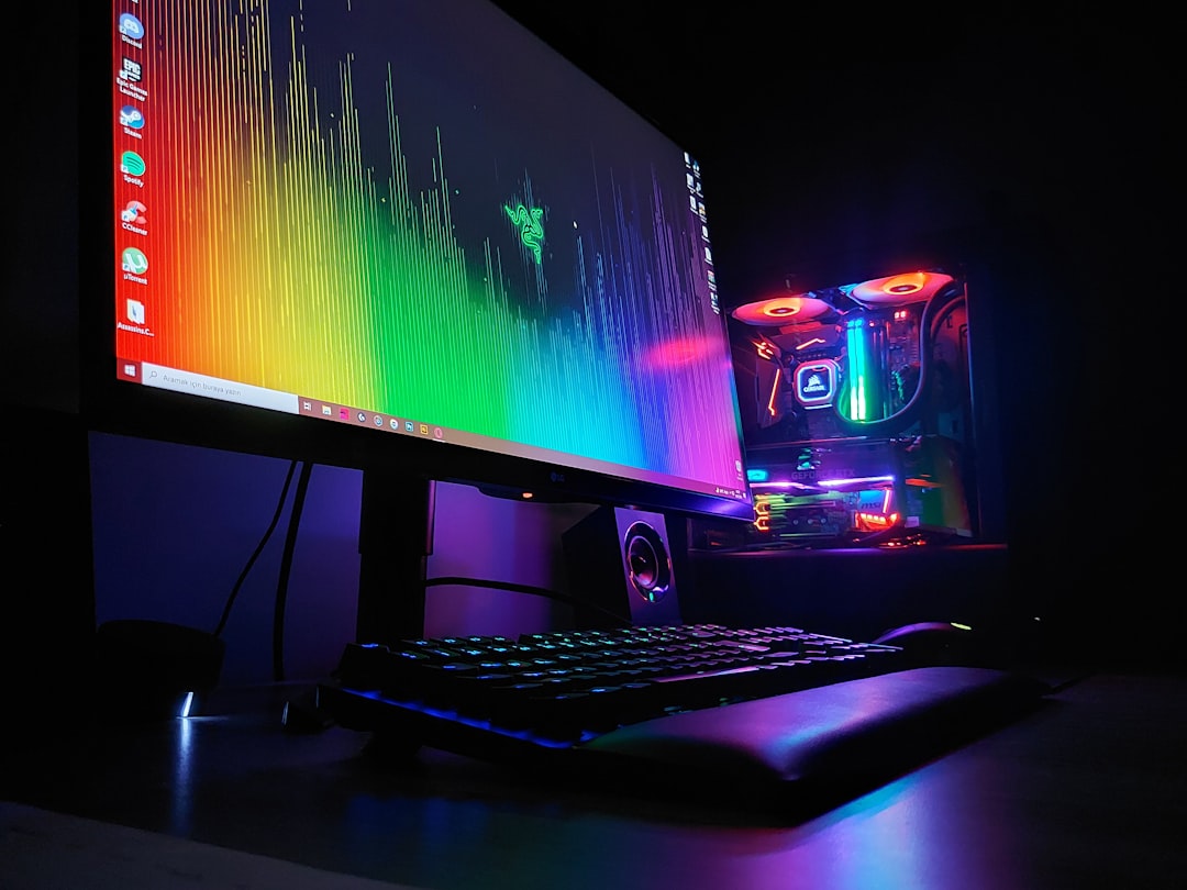 black-flat-screen-computer-monitor-turned-on-beside-black-computer-keyboard-xxl1favyoh0