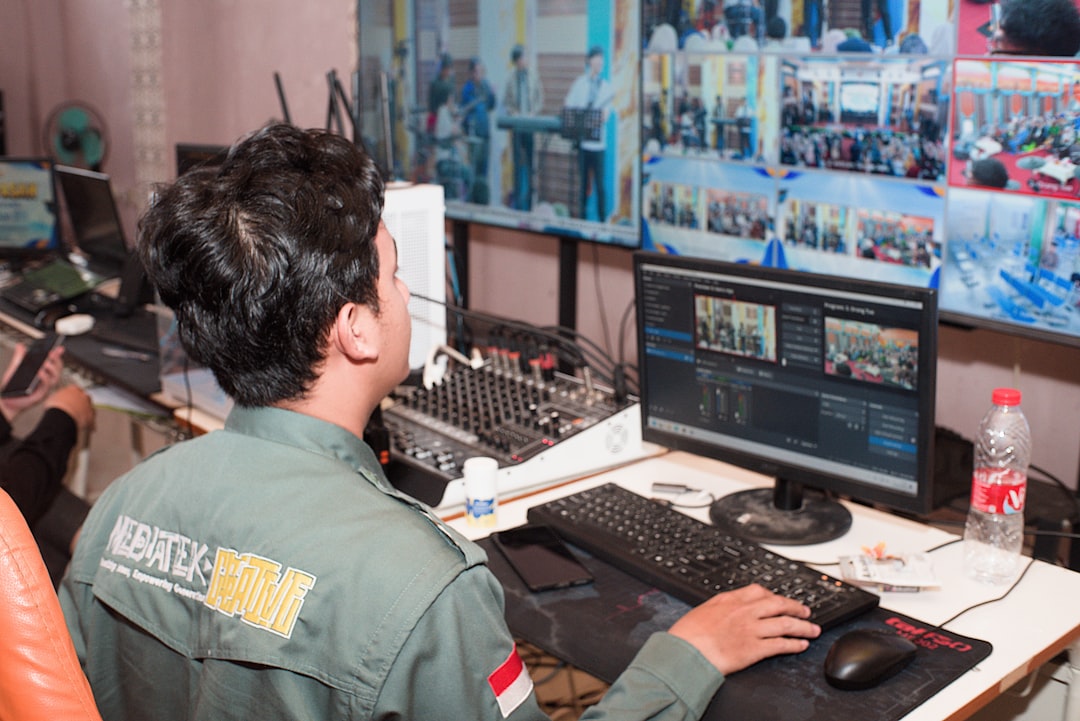 man-in-uniform-operating-video-and-audio-equipment-vwo-izfvy-k
